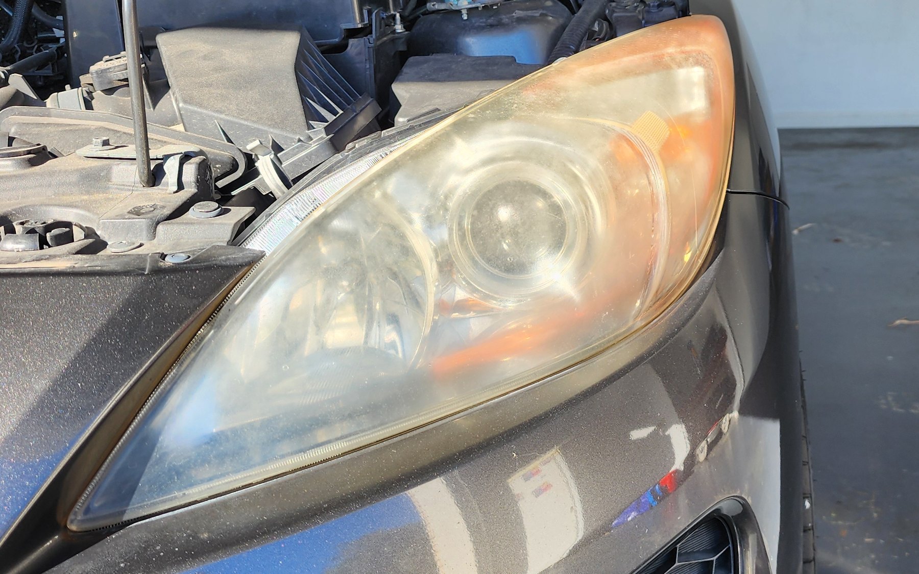Hazy, oxidised headlight before restoration