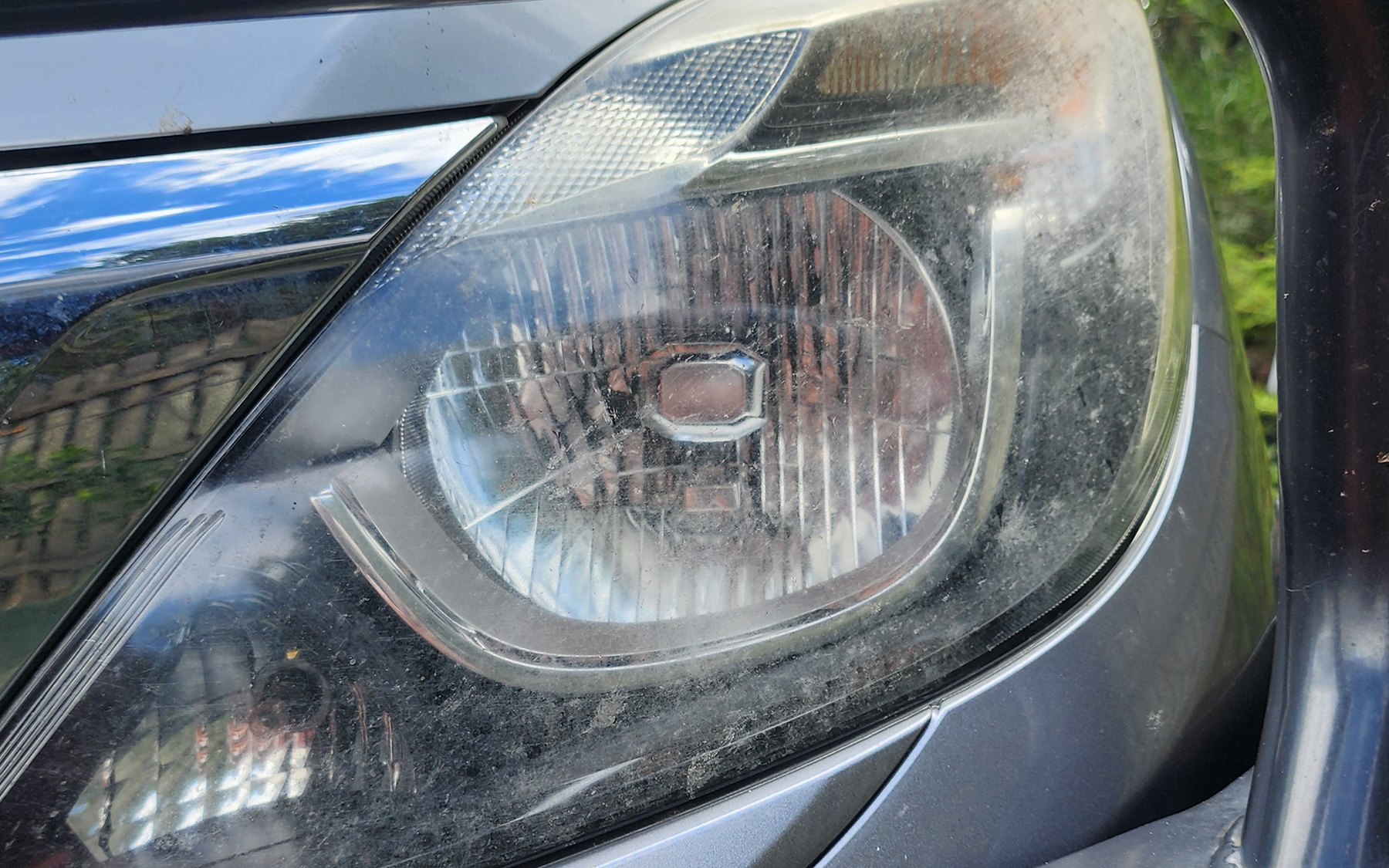 Hazy, oxidised headlight before restoration