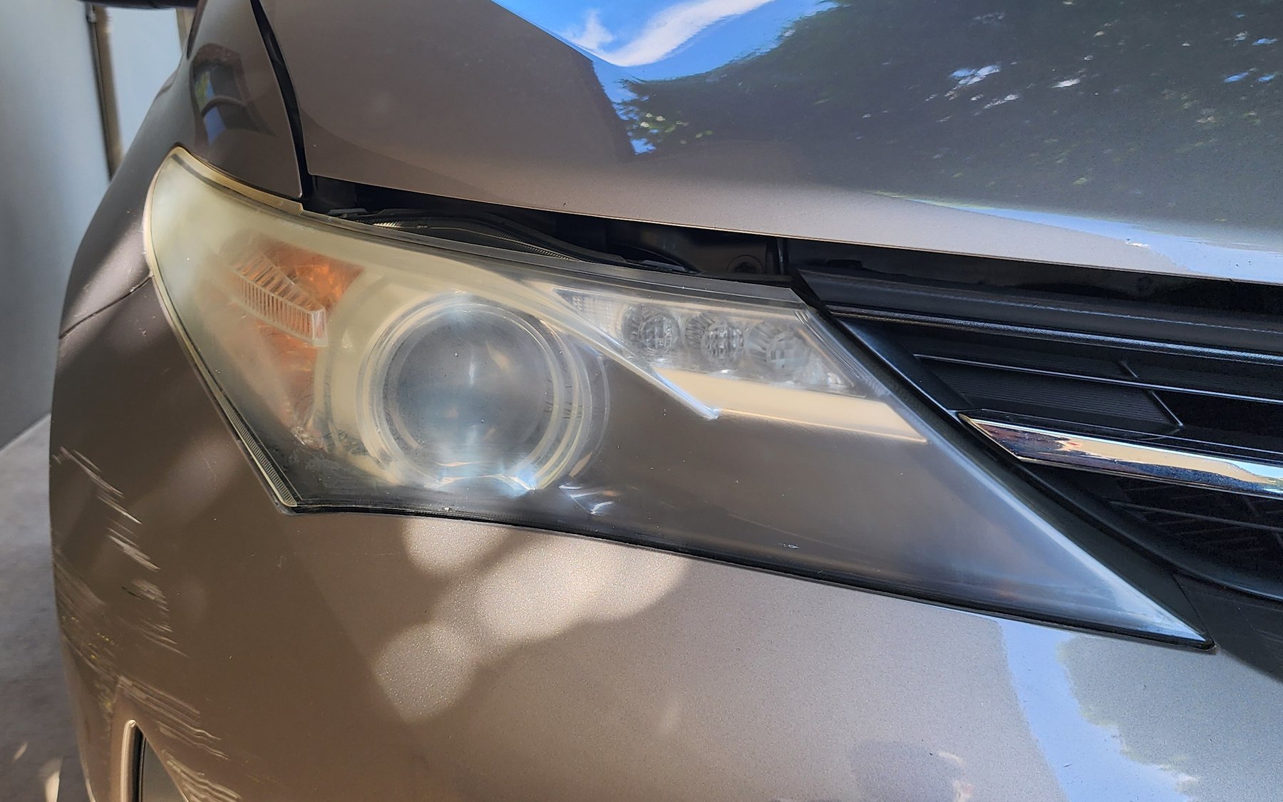 Hazy, oxidised headlight before restoration