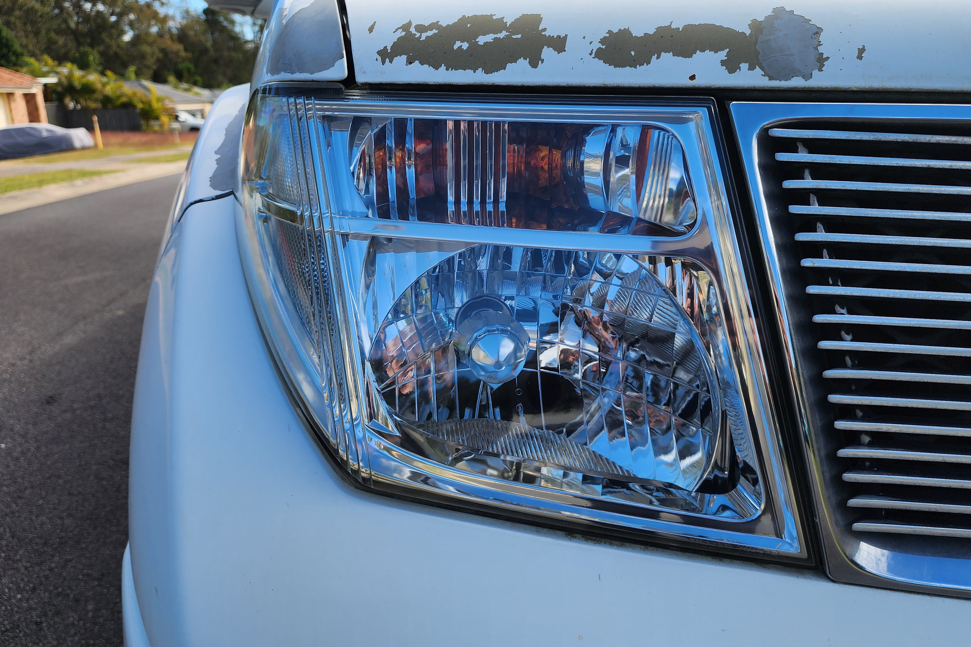 The same headlight restored to clear